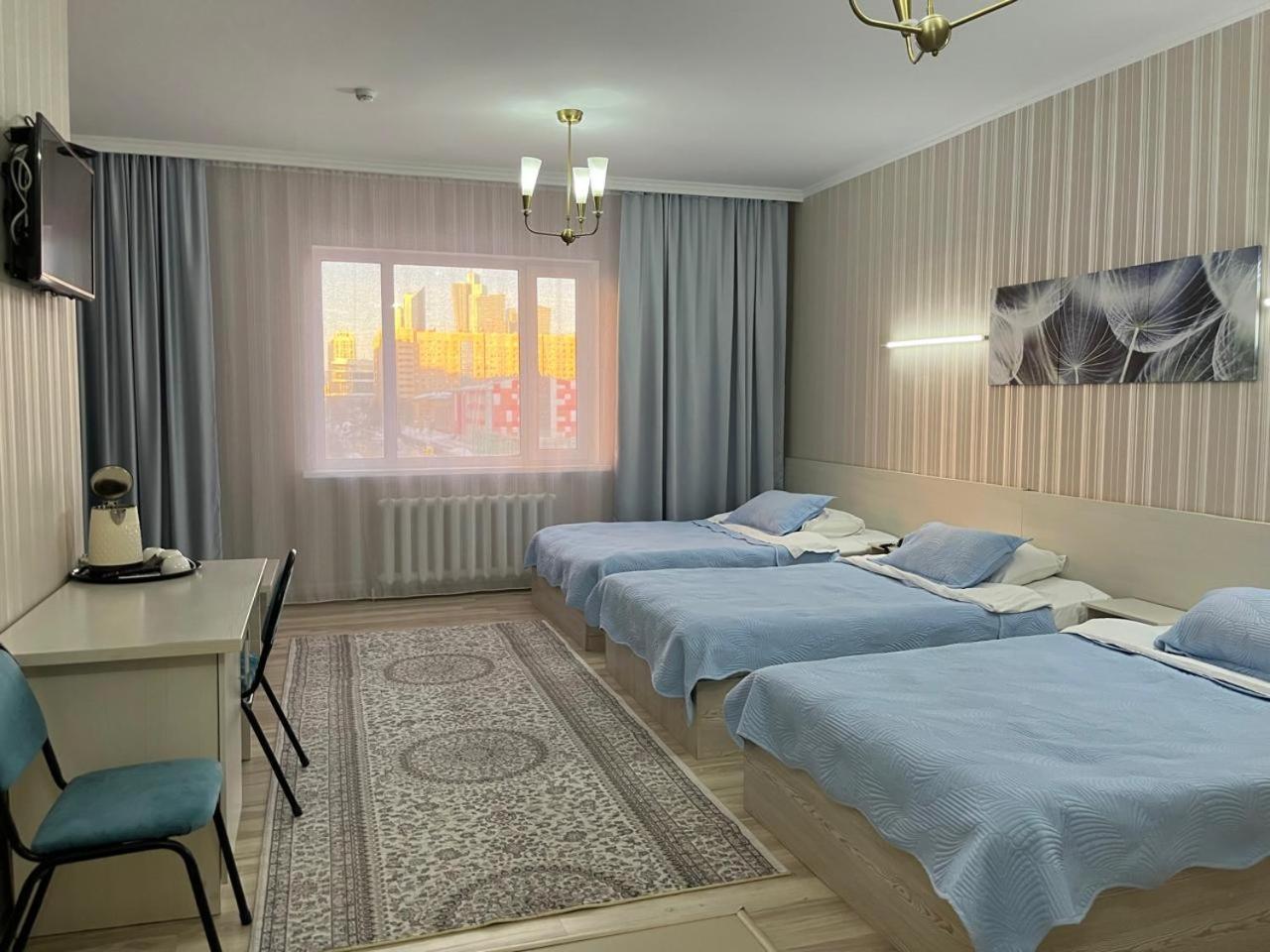 Union Plaza Hotell Astana Exteriör bild