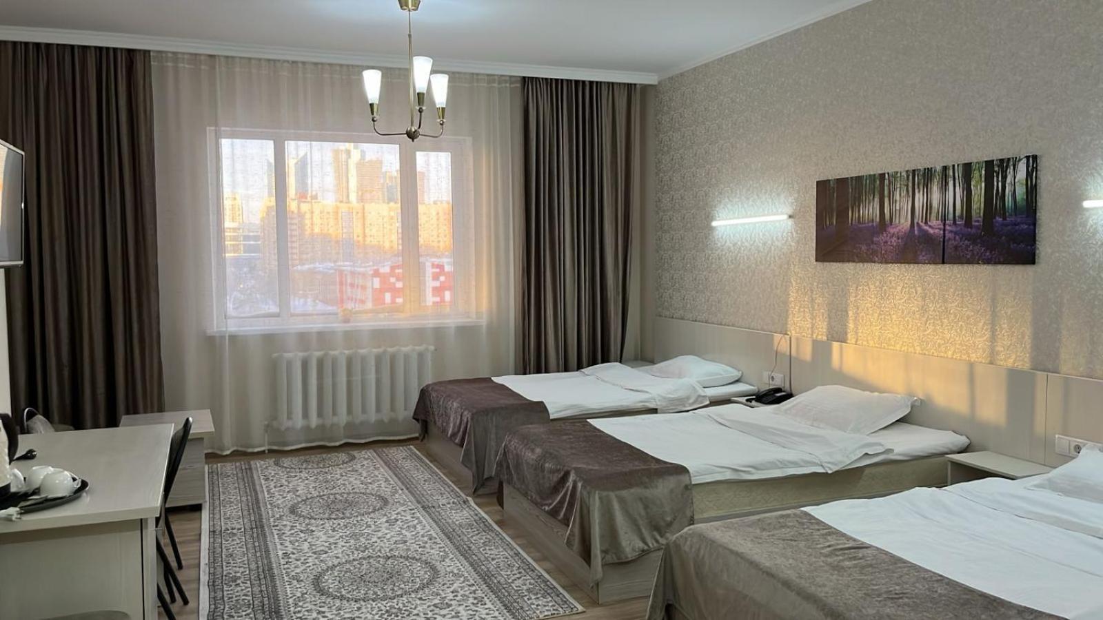 Union Plaza Hotell Astana Exteriör bild